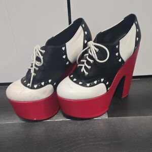 Bold Black and White Platform Shoes with Red Soles